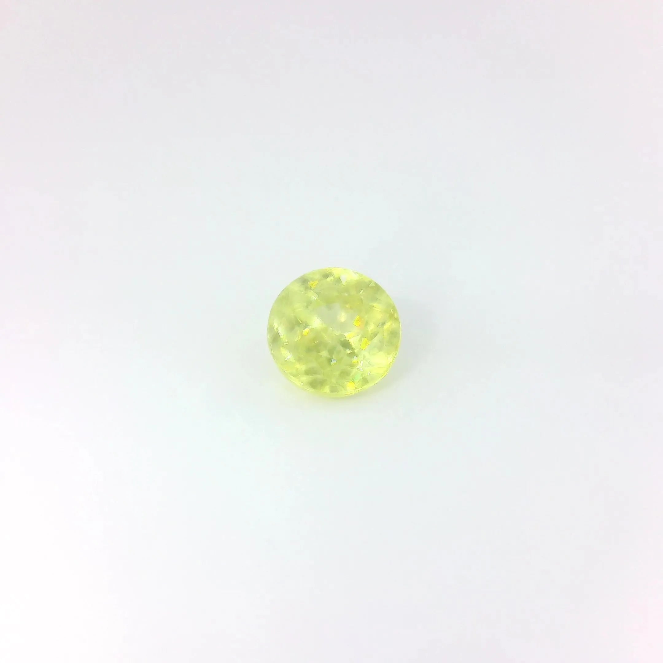 0.58ct Round Natural Sphene (Colour Yellow, Clarity Eye Clean, Cut Faceted)